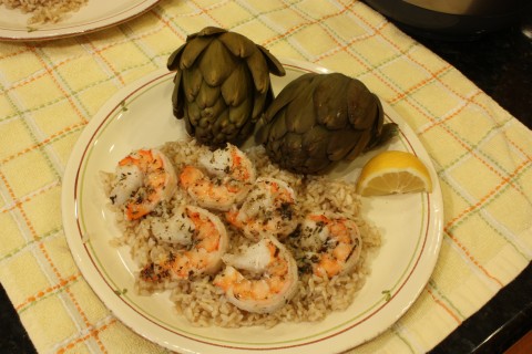 Scampi on rice with artichokes. Yum!