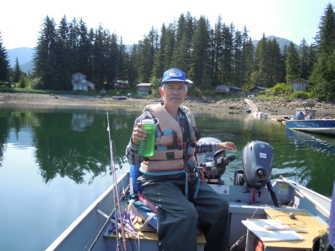 Me happily running a boat in Alaskan waters again.